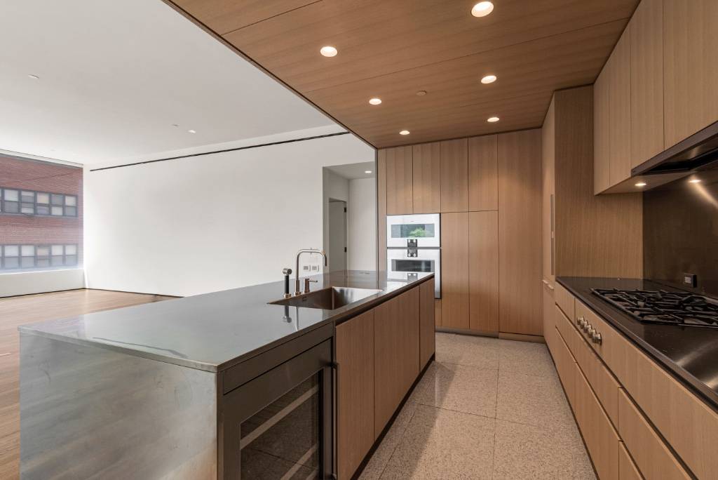 Organic textures and warm, inviting finishes coalesce in this Isay Weinfeld designed, full floor, residence at Jardim 5S is a stunning, 2 bedroom, 2.