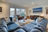 Living room with visible vents and recessed lighting