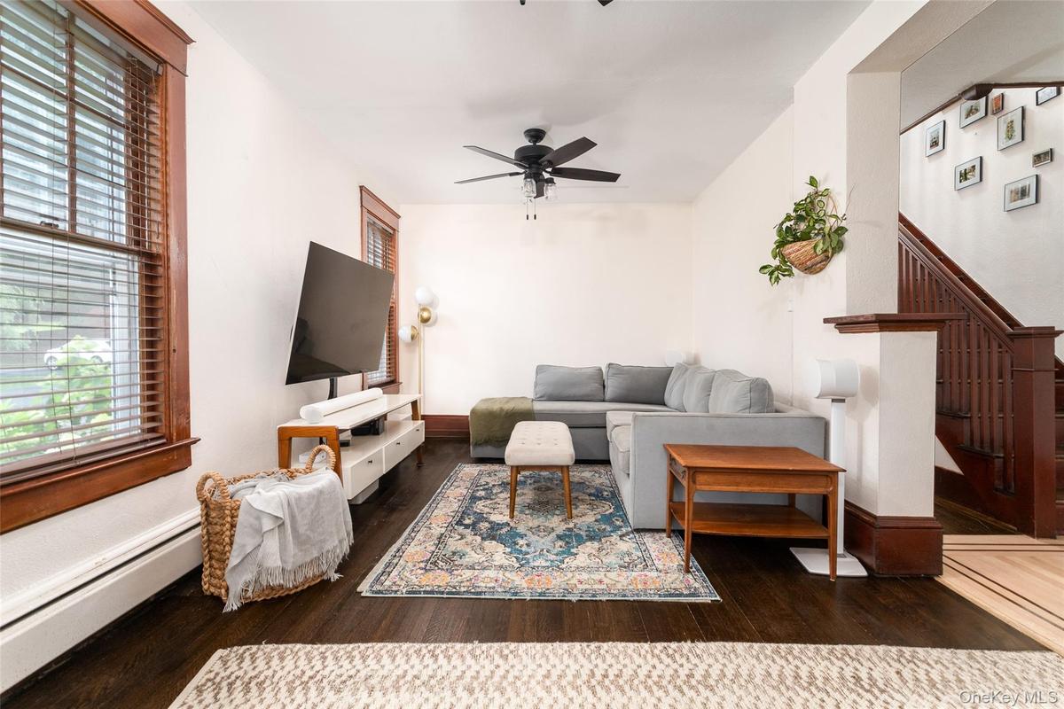 Living room with two seating areas.