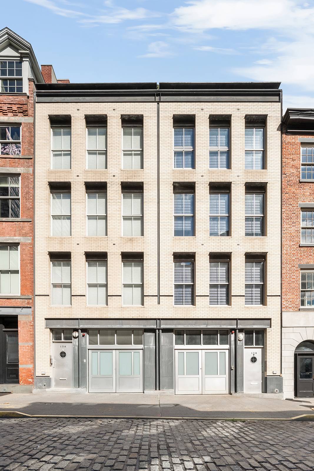 Located in the Historic South Street Seaport District, this four story townhouse has been fully renovated and features a landscaped rooftop terrace, a private garage, and comes with approved landmark ...