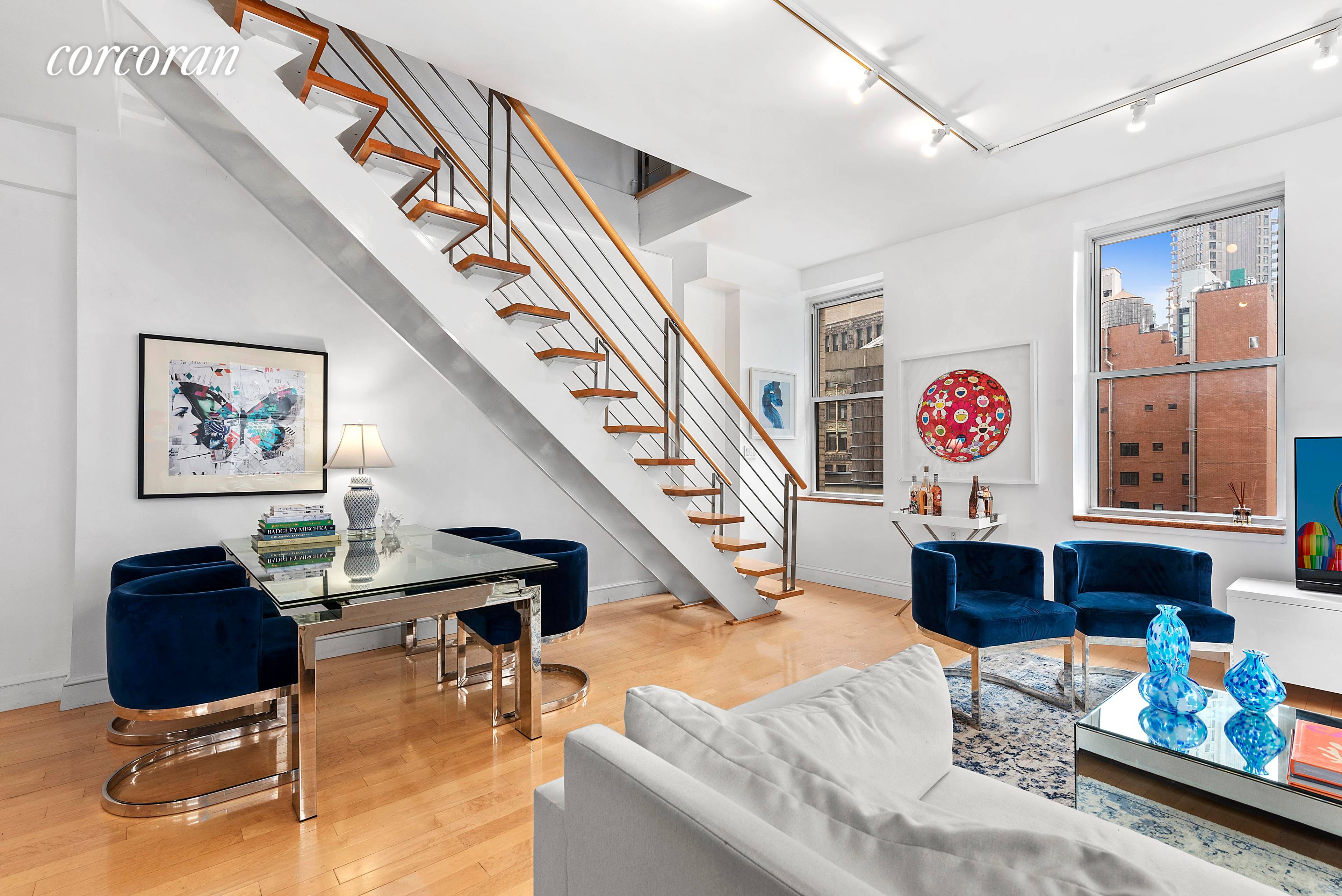 A home in the sky, this sublime duplex at Liberty Tower, 55 Liberty Street, New York NY 10005, feels like a townhouse.