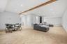 Living room with recessed lighting and beamed ceiling
