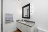 Guest bathroom in furnished Wellington Florida pool home with full shower