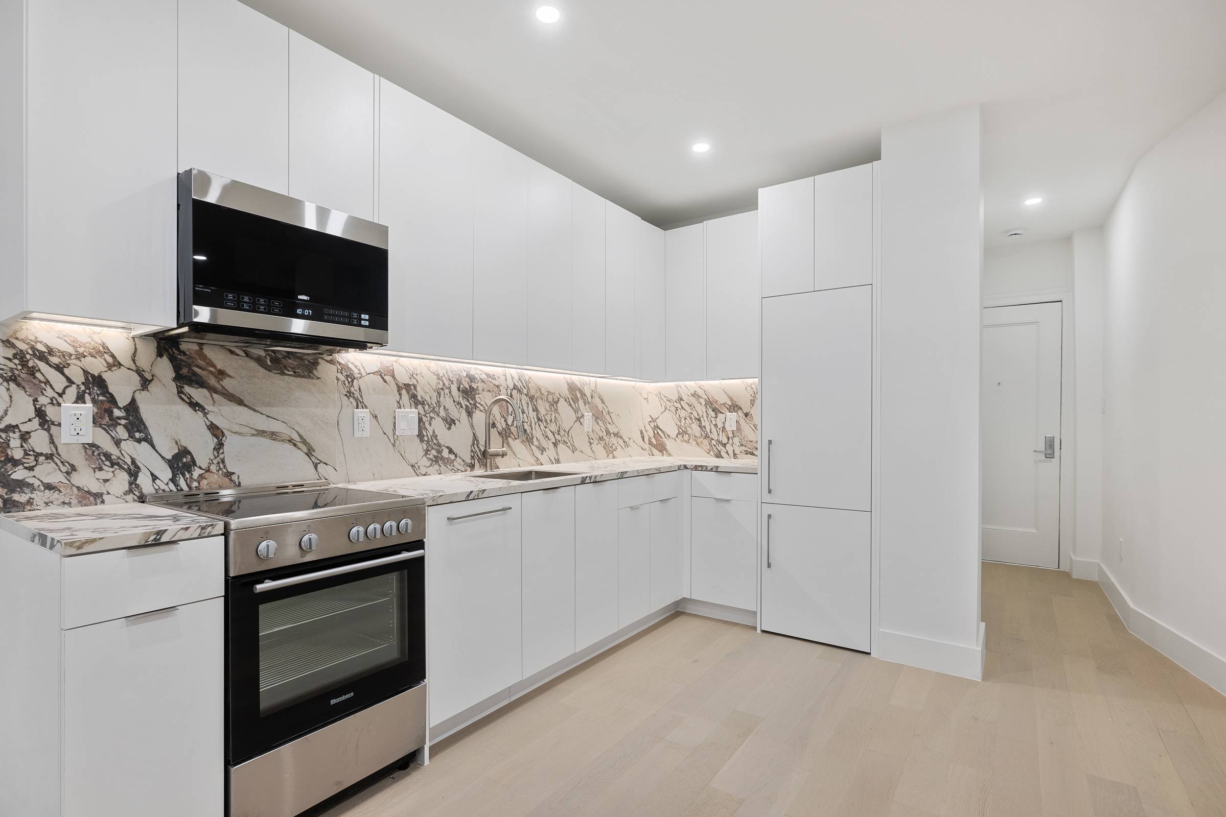 Beautifully gut renovated 1 bedroom, 1 bath residence featuring a stunning large kitchen with stainless steel appliances, wide plank Oak flooring, spacious bedrooms and in unit washer dryer.