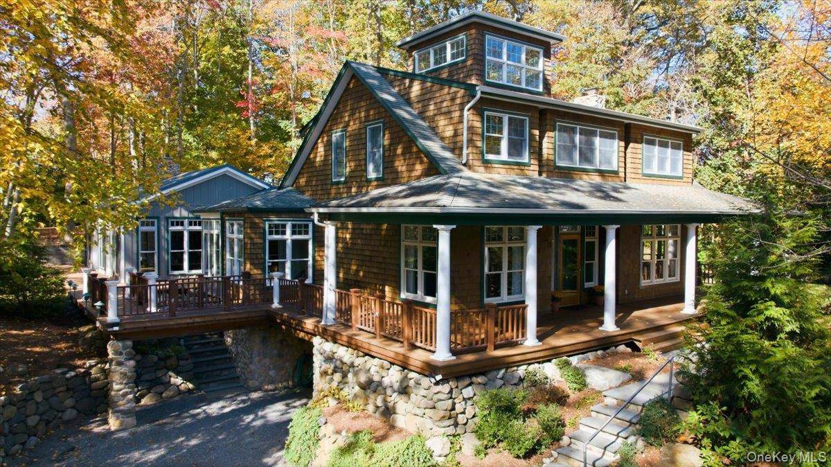 This sophisticated, fully custom Craftsman colonial is more than a house it s a stunning retreat.