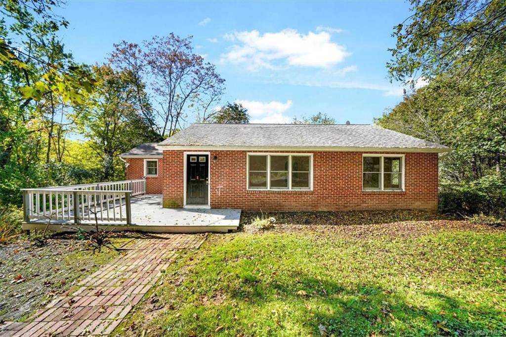 Located in desirable Marlboro, this all brick ranch style home exudes classic charm and timeless elegance.