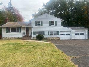 Great OPPORTUNITY to make this 3BR 2BTH split level home on beautiful half acre lot in East Norwalk your own !