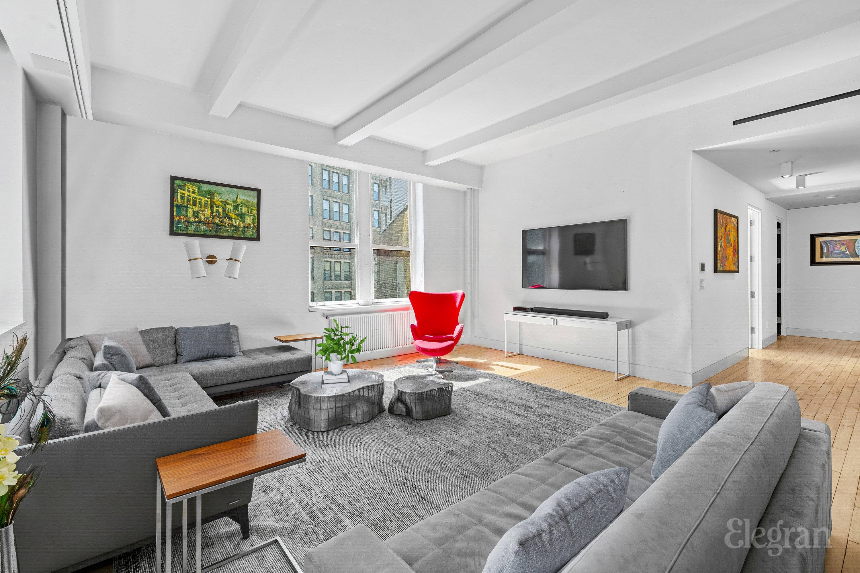 Welcome home to an unparalleled luxury loft in the heart of Flatiron !