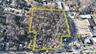 Aerial overview of property's location featuring property parcel outlined