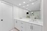 Double Sinks, Enclosed Toilet and Linen Closet