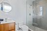 Bathroom with vanity and shower