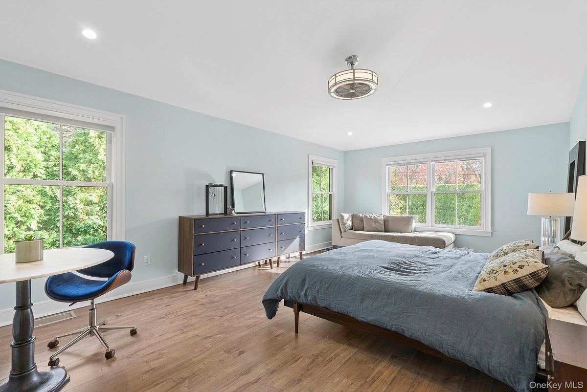 Bedroom featuring wood finished floors and recessed lighting