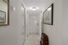 Entry foyer with storage closets