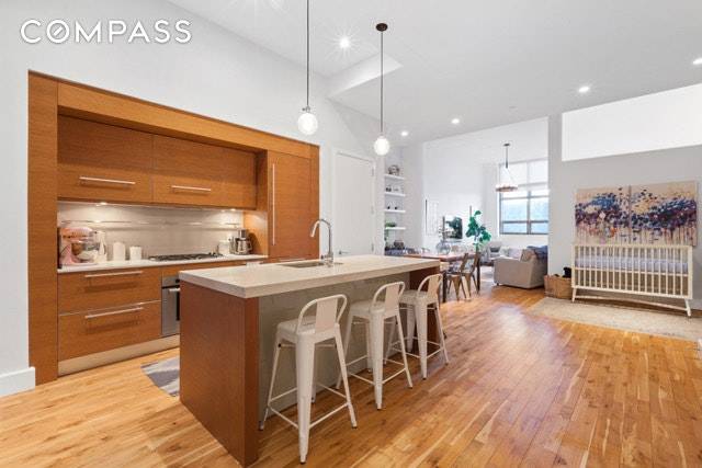 Available December 1st. This impeccable, stylish, and unique turn key one bedroom one bath loft apartment, converted from an open floor plan, features soaring 13' ceilings, solid oak floors and ...