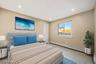 Bedroom featuring a baseboard radiator and recessed lighting