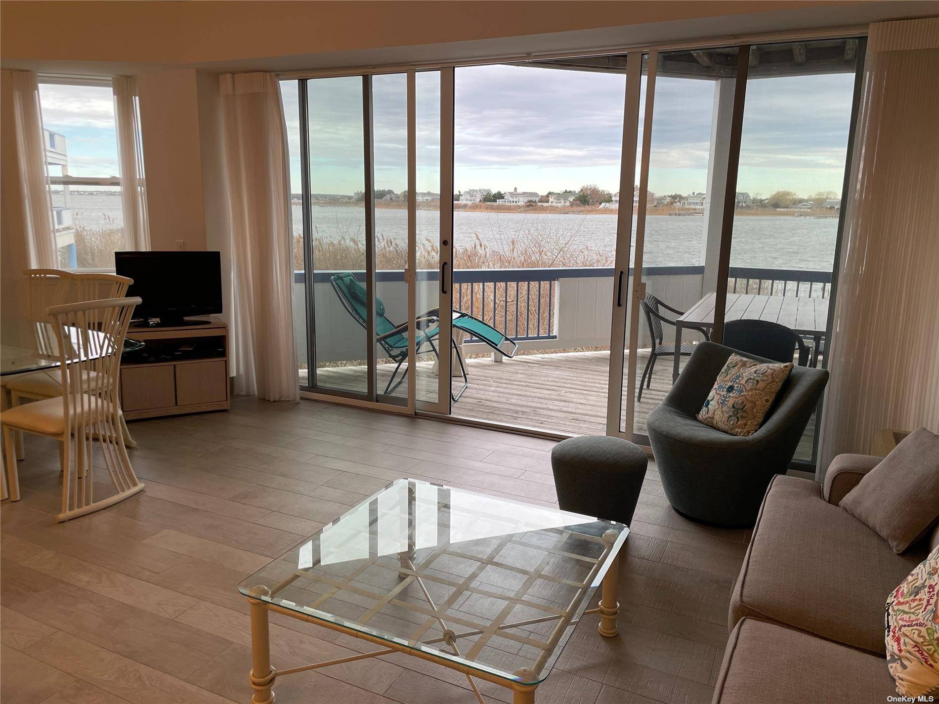 Spacious 2 bedroom 2 bath Dune Road bayfront has amazing views of Moriches Bay.