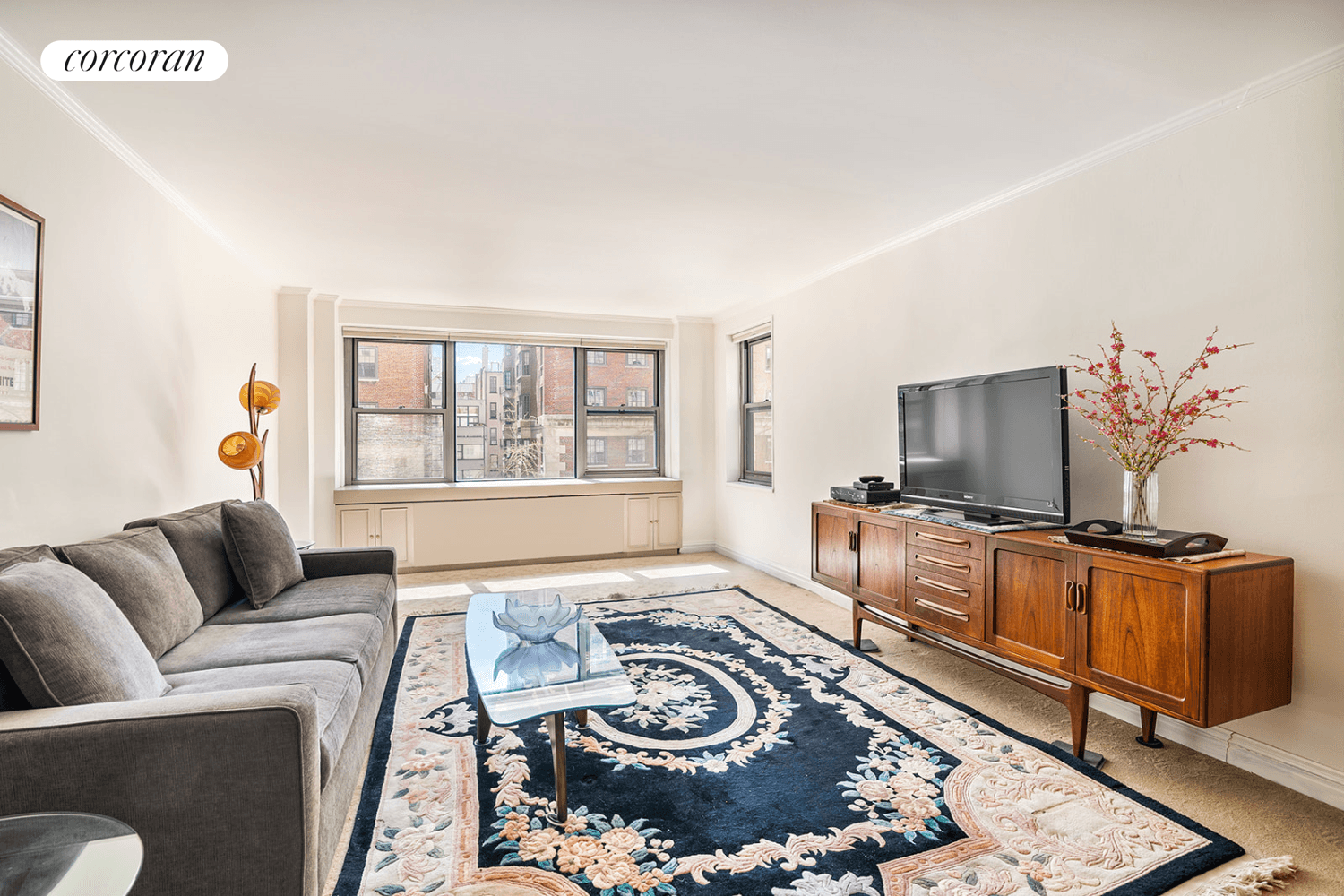 A rarely available and very spacious measuring at approximately 1, 623 square feet five room home in a full service Upper East Side co op near Carl Schurz Park is ...