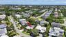 This lovely home enjoys a good-size pie-shaped lot on an impeccable street East of US-1 surrounded by picture perfect custom homes.