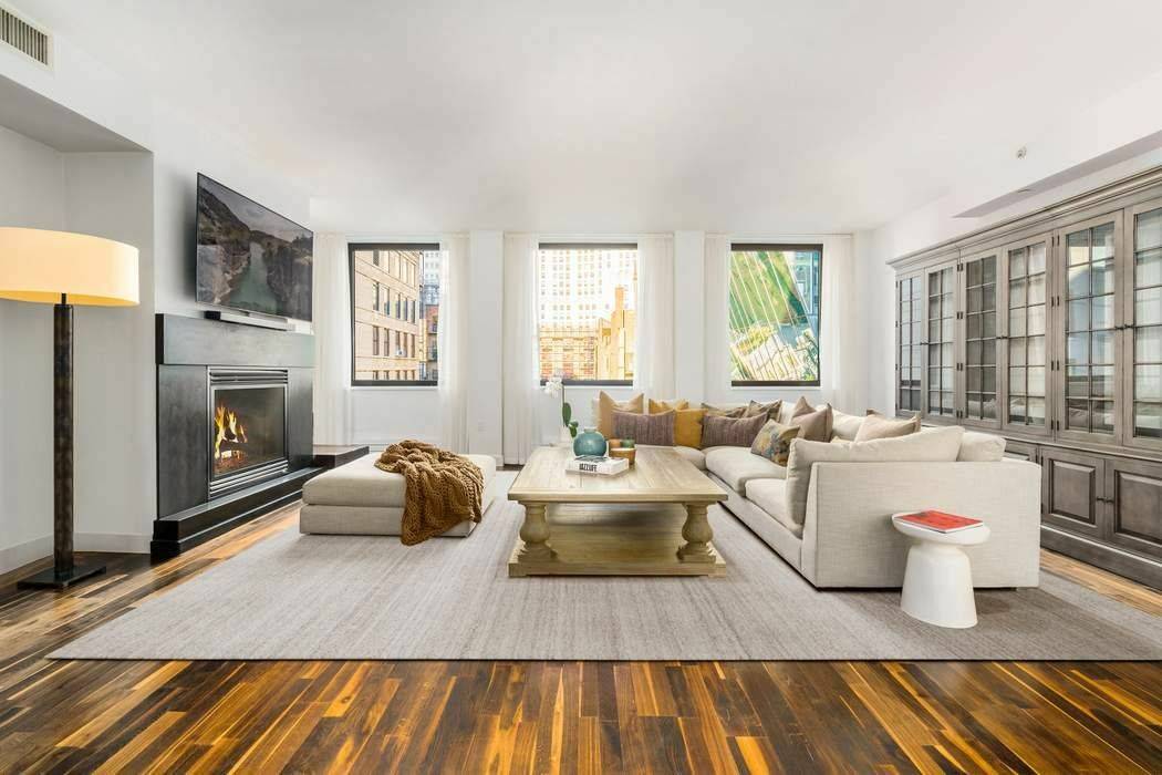 Move right in to this extraordinary sun blasted prewar loft that features soaring ceilings, a gas burning fireplace, three exposures north, west amp ; south and oversized gallery walls.