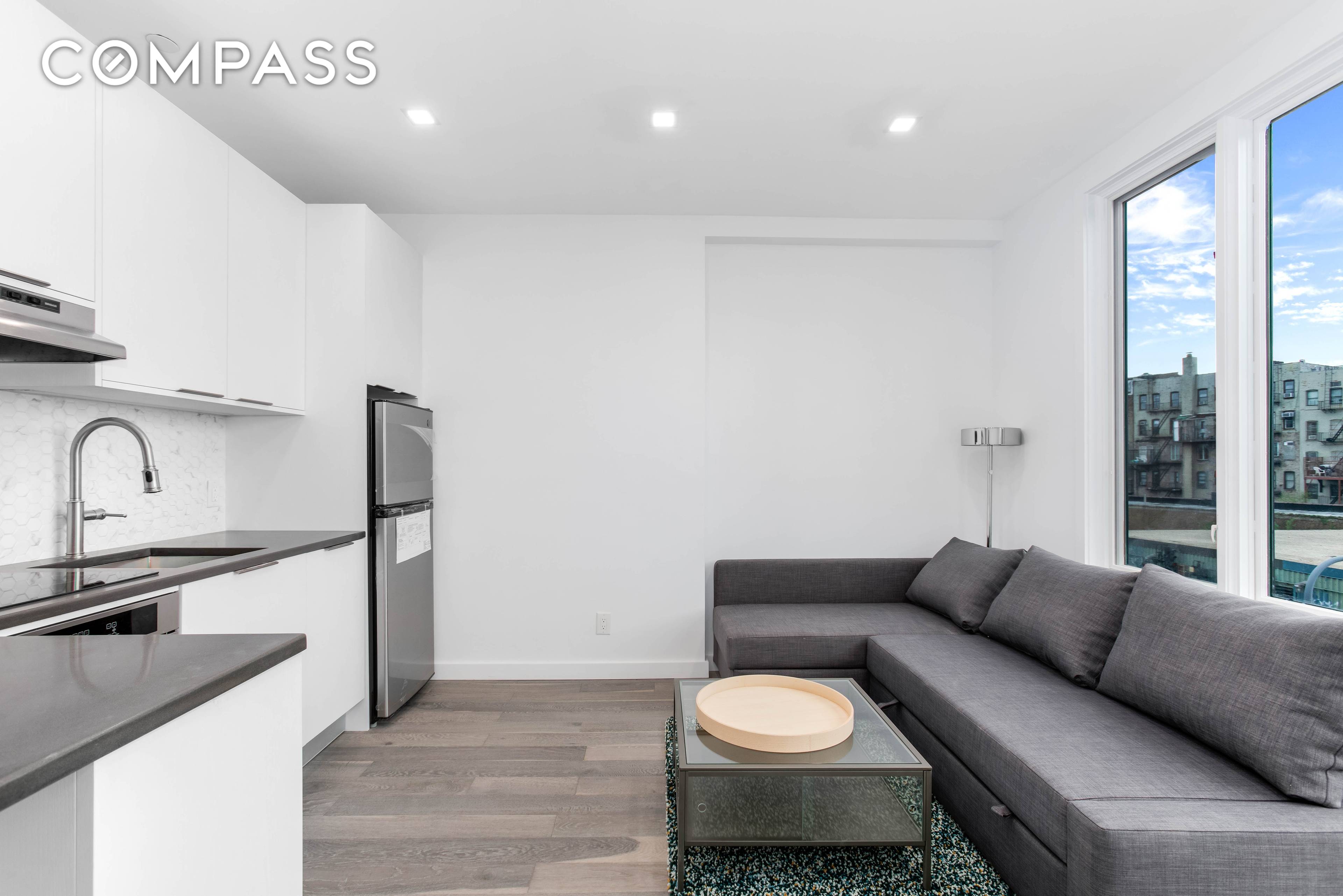 Williamsburg Elevator Building Newly Renovated 2BD 1BA Home with Balcony, Central Air, Hardwood Flooring, Loft like Ceilings, Sound Proof Windows, Chef s Kitchen with Integrated Appliances, Video Intercom and Roof ...