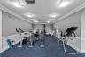 Bridgeton's community fitness room with cardio and strength equipment.