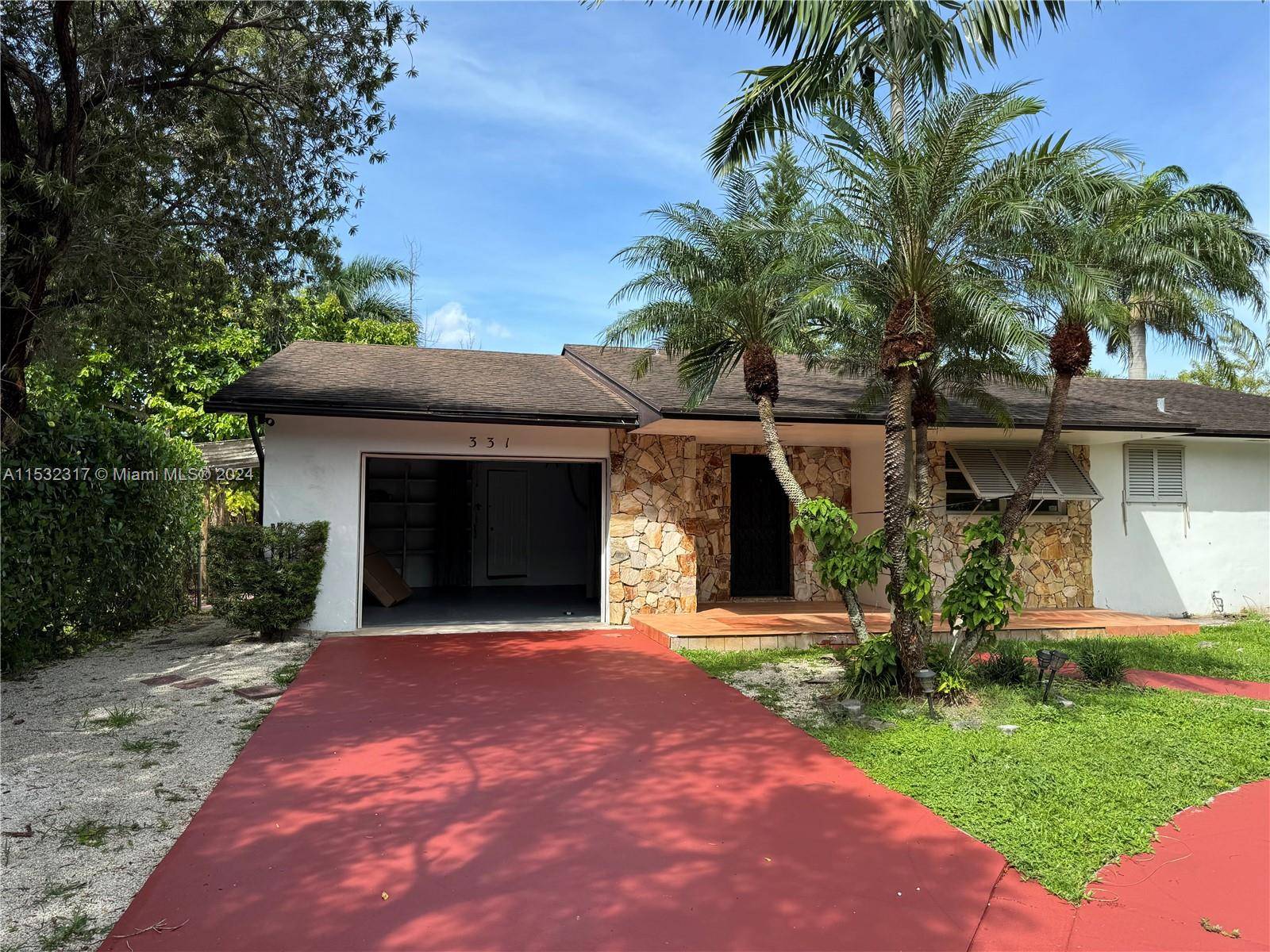 Single family pool home in Biscayne Gardens.