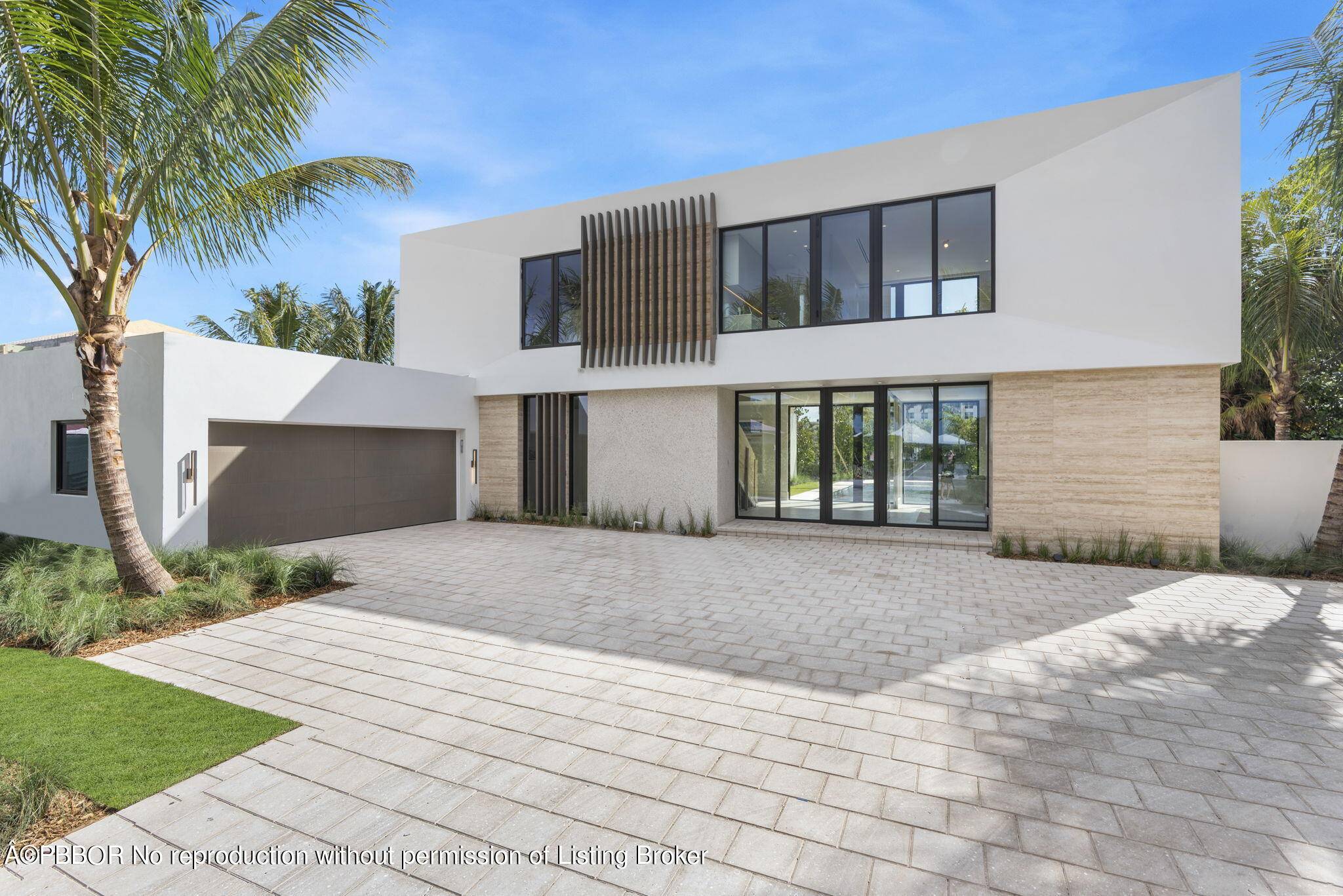 Spectacular New Construction Waterfront Modern home on sought after Ibis Isle of Palm Beach.