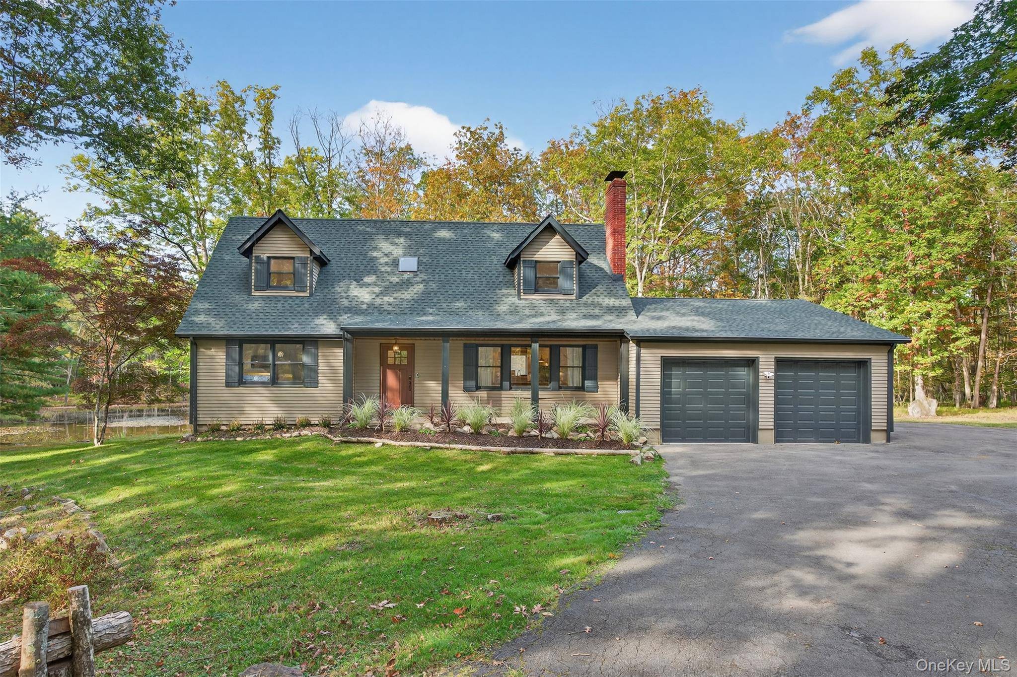 Welcome to your private Hudson Valley sanctuary an exquisite fully gut renovated 4 bedroom, 4 bath elevated Cape Cod escape on 24 secluded acres directly bordering the Mohonk Preserve.