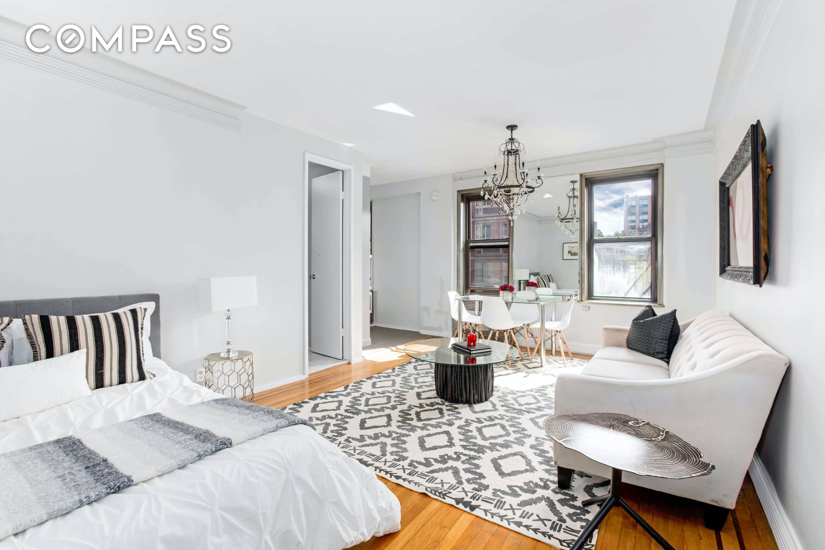 Combining a smart use of space, modern updates and charming architectural details, this bright studio is a sunny and serene haven in an inviting Chelsea co op building.