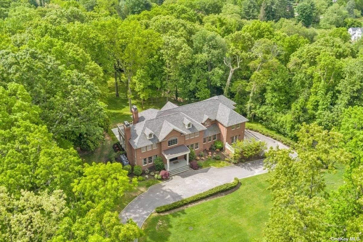 Welcome into this spectacular Upper Brookville estate.