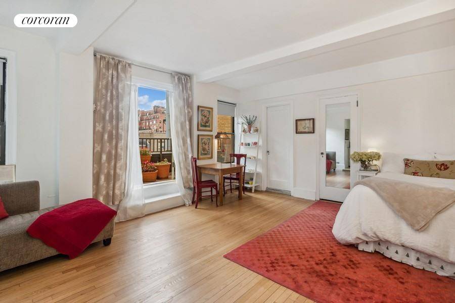 Breathtaking Prewar studio with a large private terrace 25' x 8' on the 14th floor of the Bancroft is just one half a block from Central Park, the iconic Dakota, ...