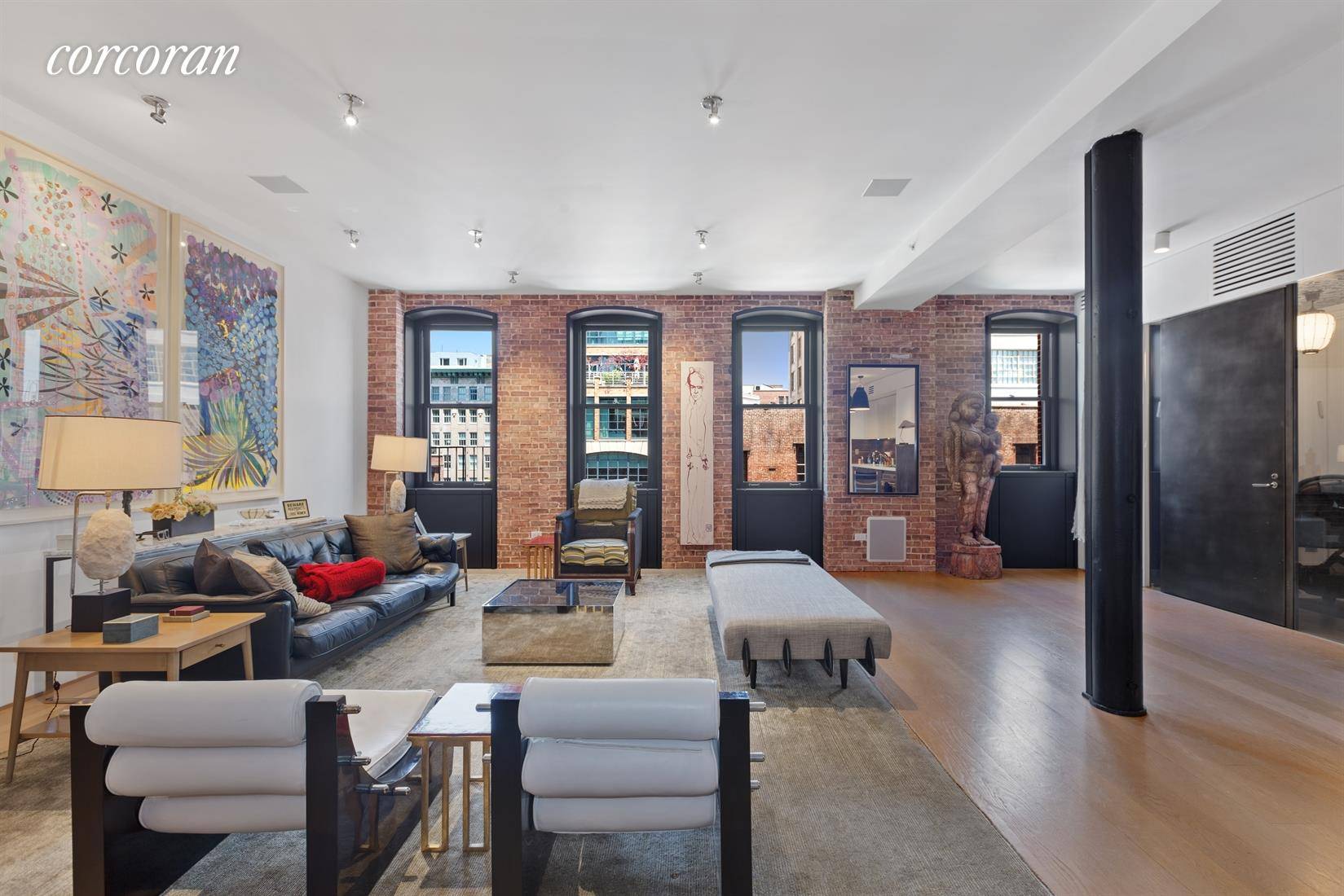Welcome home to this quintessential Tribeca loft.