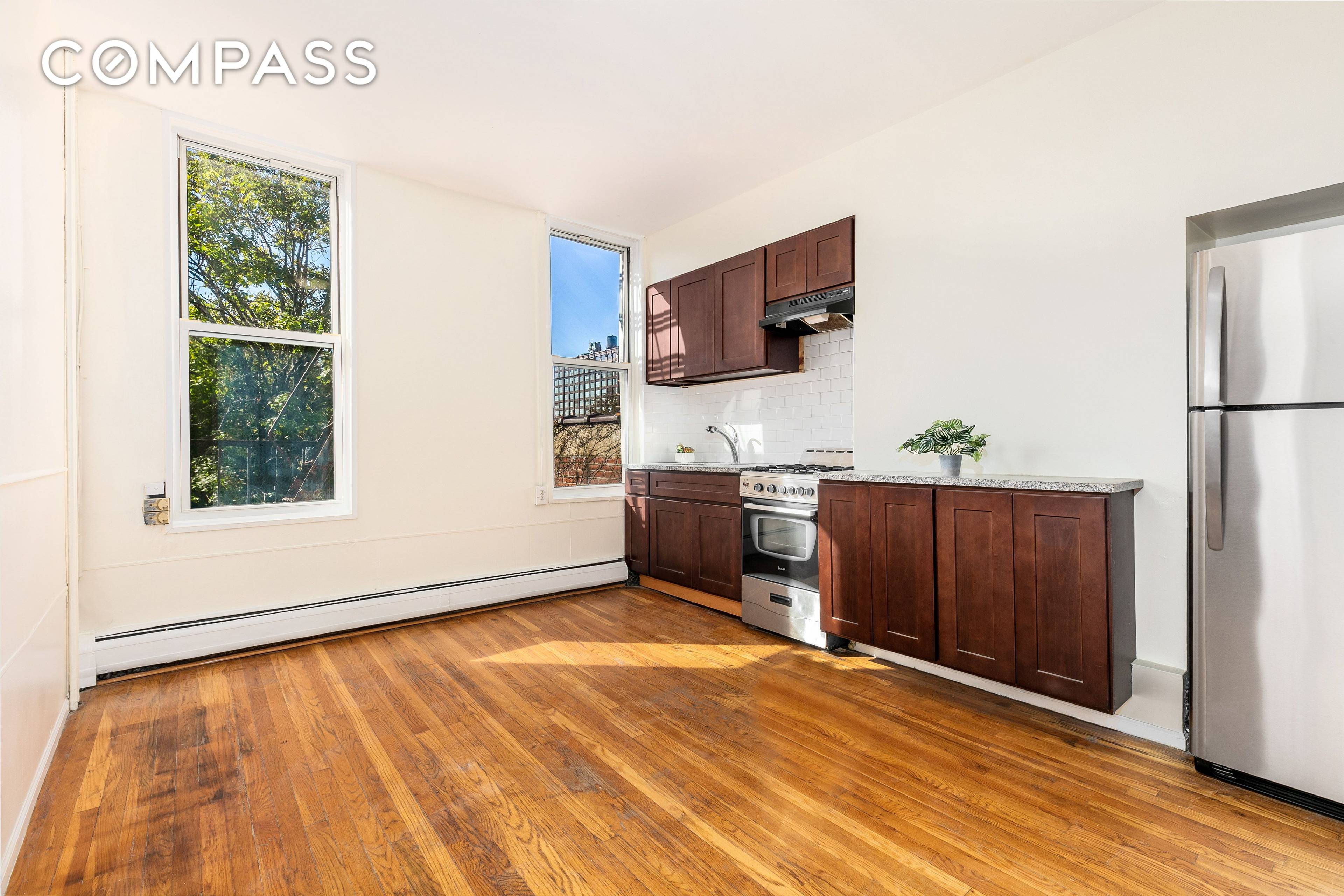 Rarely does a true 3 family property become available in the up and coming neighborhood of Greenwood Heights, offering spacious living and serene surroundings.