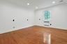 Generous proportions and a spacious walk-in closet make this bright third-floor 5th bedroom a standout space, ideal for family, guests, or work-from-h