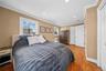 2 bedrooms combined into one Premier Bedroom featuring crown molding, recessed lighting, wood finished floors, double sized room