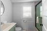 Full bathroom featuring vanity, shower / bath combination with glass door, and toilet