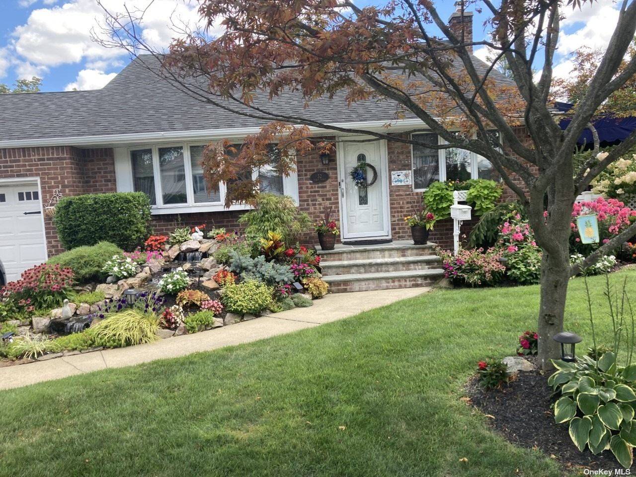 THIS HOME WELCOMES YOU TO A PROFESSIONALLY LANDSCAPED PARK LIKE PROPERTY.