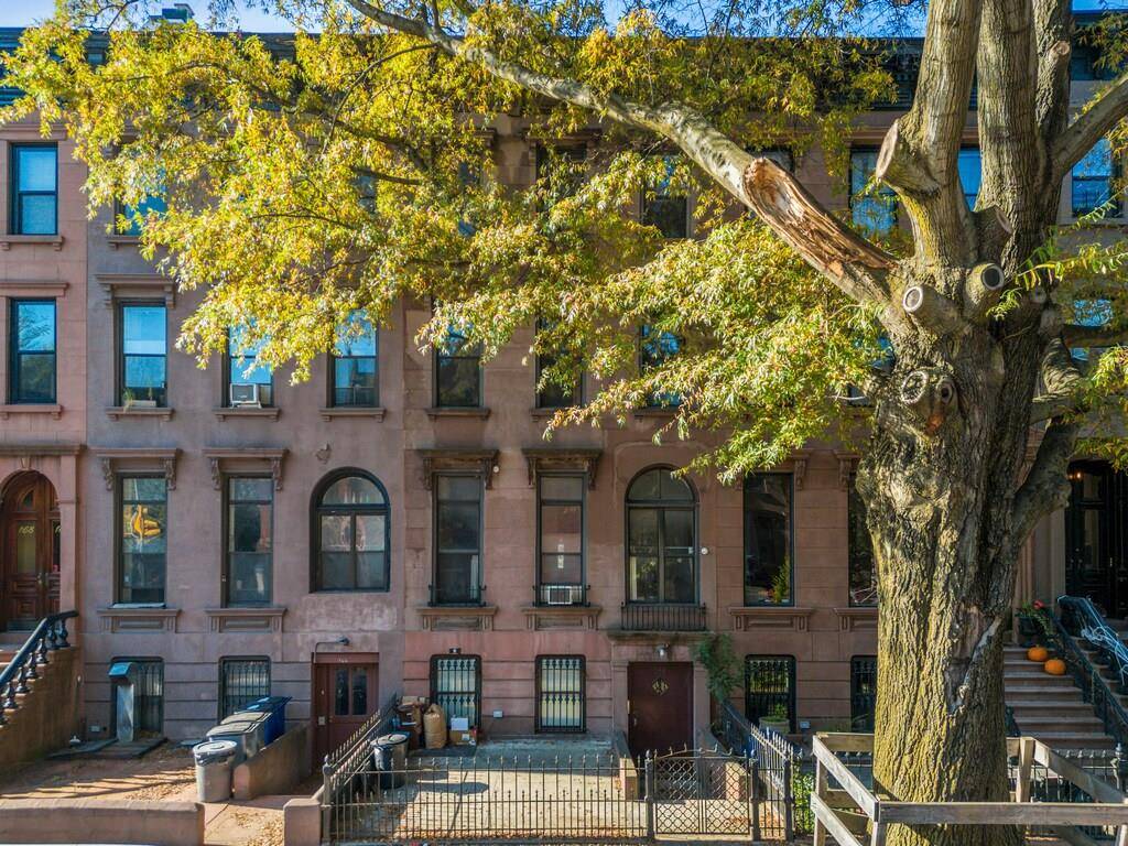 Park Slope North, 20 foot wide, nearly 4, 000 sq ft Historic Italianate Brownstone.