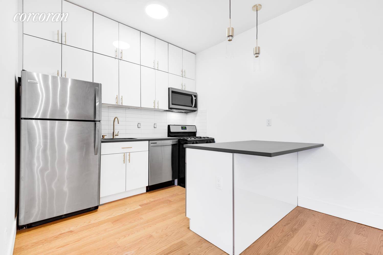 Stunning and Brand New Three Bedroom, two bath Home in the heart of Astoria right by the Steinway Street Train Station.