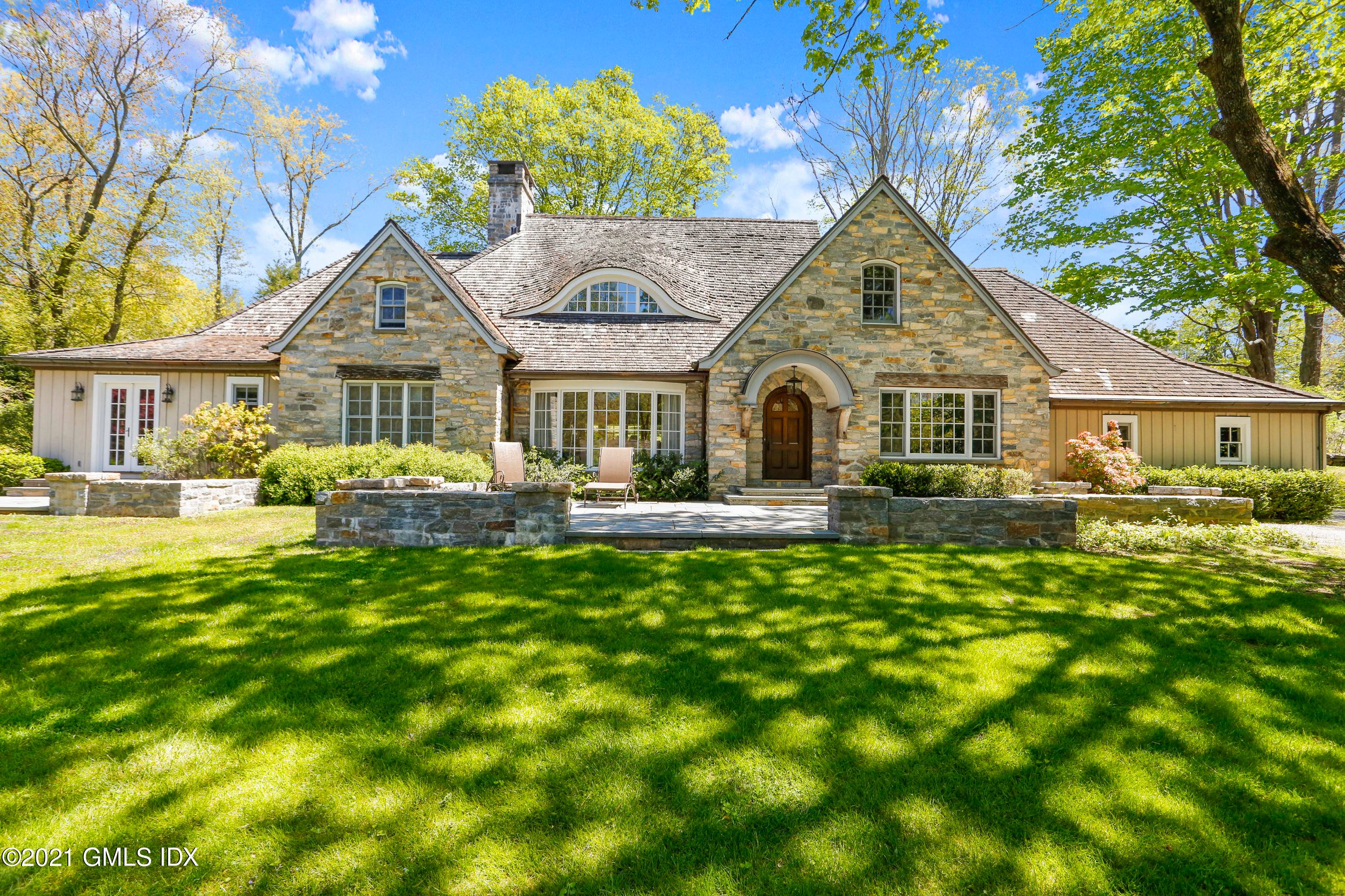 This beautifully refreshed stone residence secluded on a quiet mid country cul de sac is ready for you to customize.