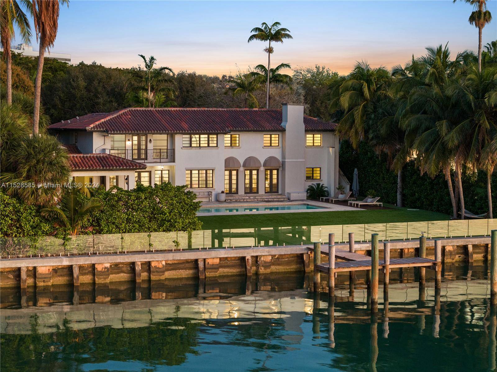 Spanish Mediterranean Architectural beauty on gated private Bay point.