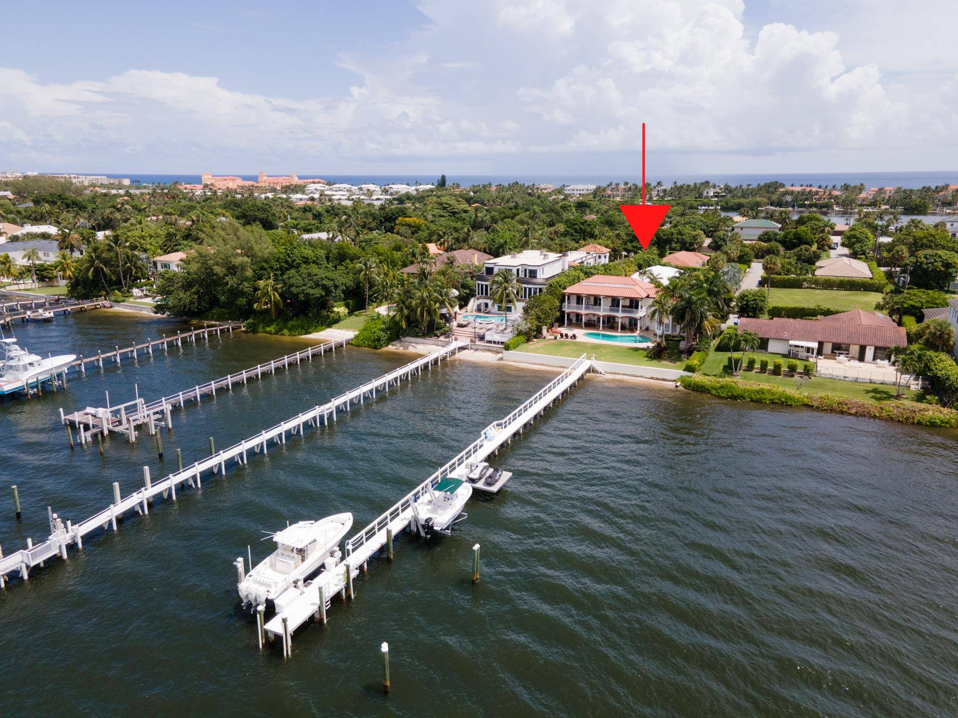 Fabulous family vacation home in the exclusive Manalapan Hypoluxo Island community tucked away in a quiet cul de sac on a 100' water frontage lot overlooking the Intracoastal waterway.