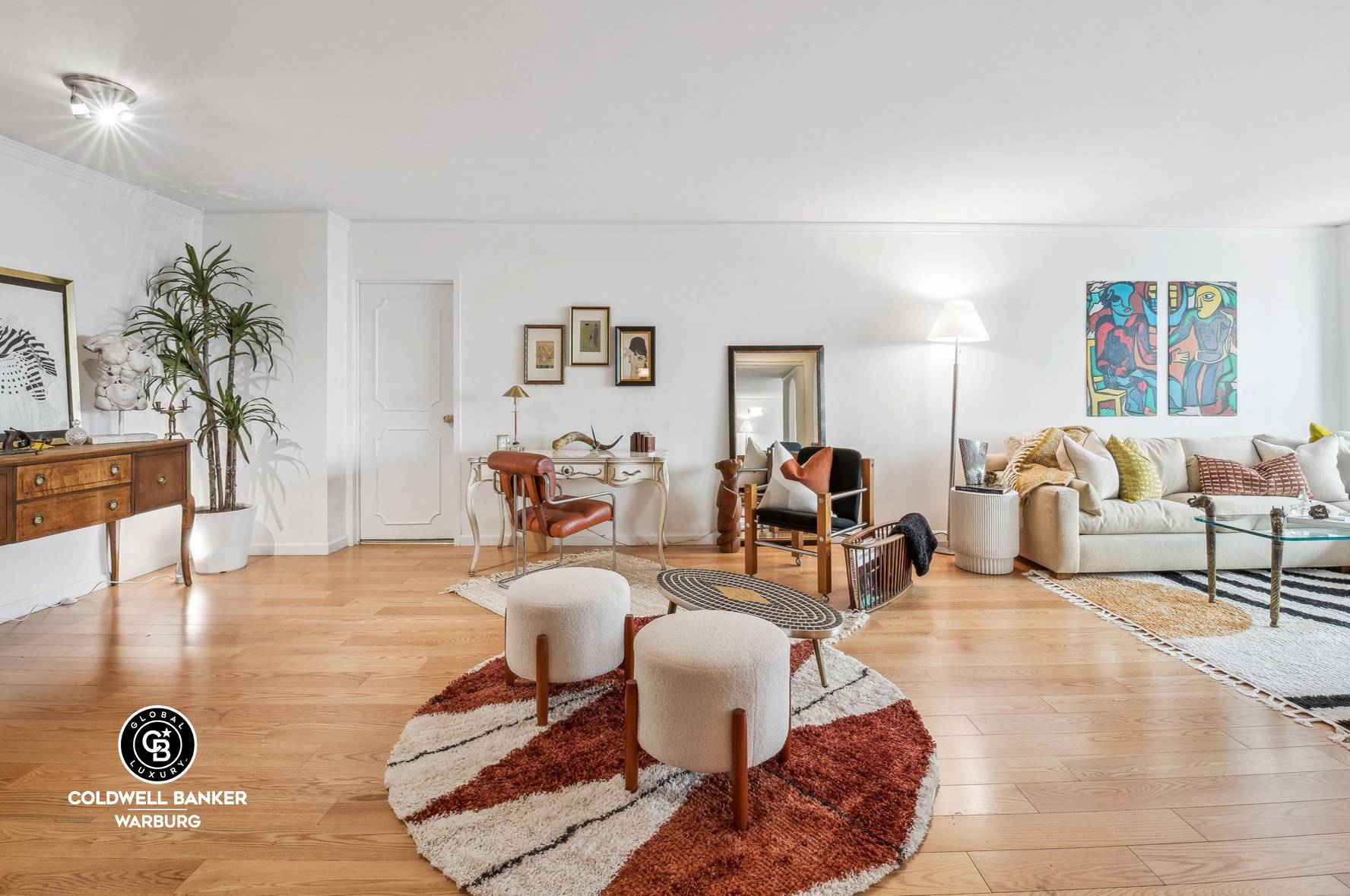 Move right into this oversized split two bedroom, two bathroom apartment featuring a sprawling open concept central living room with an adjacent dining area, marble bathrooms, and a windowed kitchen ...