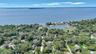 View of property location with a nearby body of water