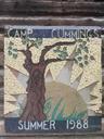 One of the mosaics from Camp Cummings still remains on one of the buildings.