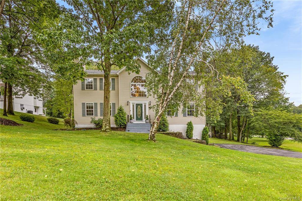 A commuter DREAM ! This stunning colonial is just 15 minutes to the train and under 90 minutes to NYC !