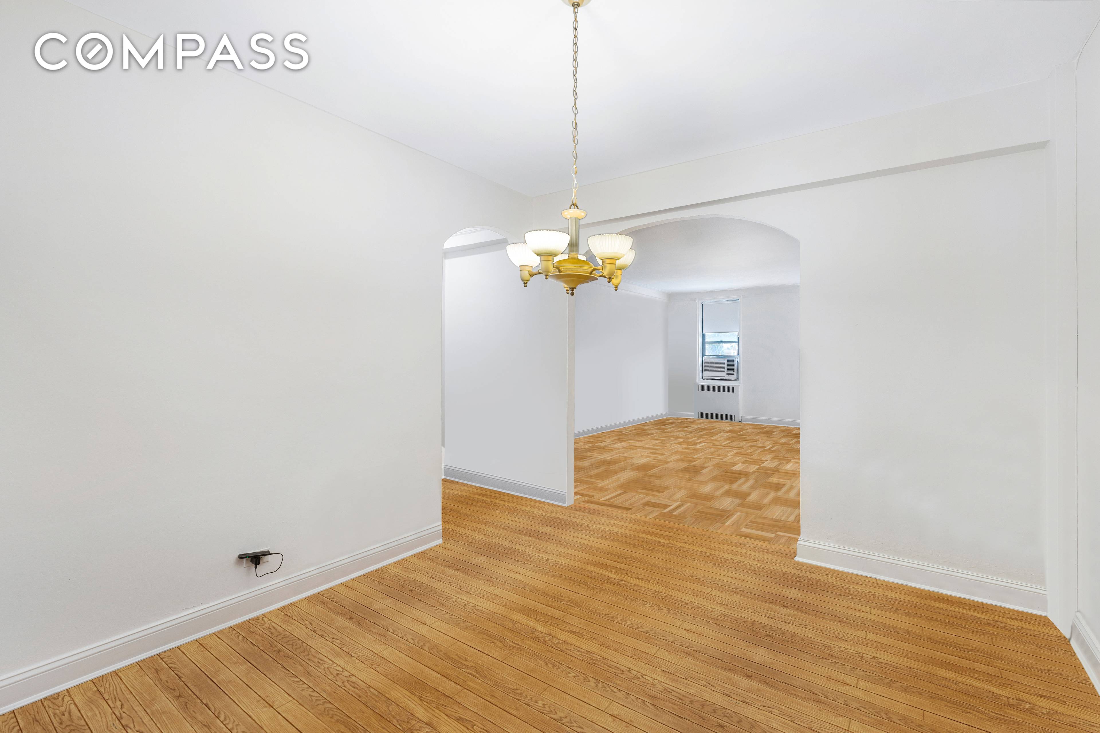 This sprawling Art Deco inspired co op features three bedrooms and two baths.