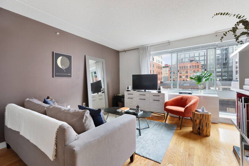 Bright West Chelsea alcove studio in a luxurious full service condominium building.
