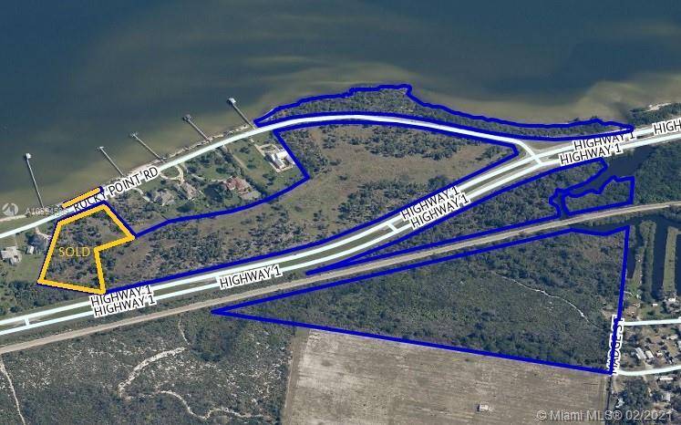 Great large parcel of about 23 acres with interior, river view and river access lots on Rock Point bordering the Indian River !
