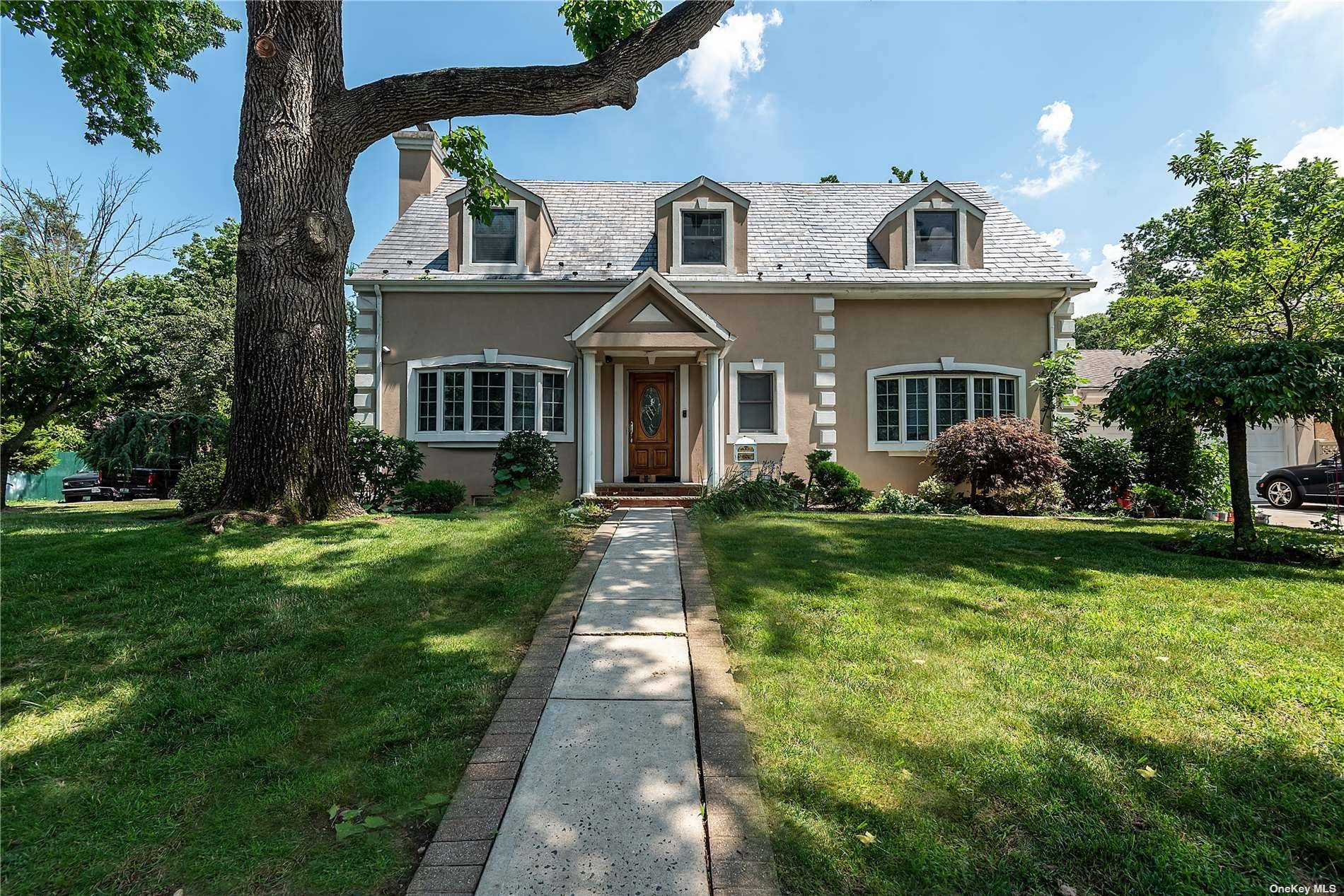 Welcome to this expanded Colonial in the heart of Bayside.